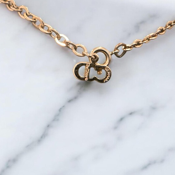 Christian Dior Vintage Gold-Tone Logo Oval
Pendant Necklace - Made in Germany - Picture 3 of 6